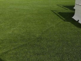 Why should artificial grass be considered for interior design